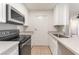 Updated kitchen features stainless steel appliances and a streamlined design at 5101 Renault Ave, Las Vegas, NV 89142