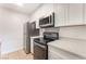 Well-equipped kitchen showcasing stainless steel appliances and ample counter space at 5101 Renault Ave, Las Vegas, NV 89142