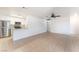 Open living space with tile floors, a modern kitchen, and stainless steel appliances at 5101 Renault Ave, Las Vegas, NV 89142