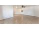 Large, open living area featuring tile floors, recessed lighting, and ample space at 5101 Renault Ave, Las Vegas, NV 89142