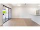Open living area with tiled flooring, neutral walls, and access to outdoor patio at 5101 Renault Ave, Las Vegas, NV 89142