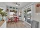 Cozy dining area with patio door and view of outside patio at 5228 Harmony Ave, Las Vegas, NV 89107