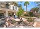 The backyard features a well manicured garden and patio area for entertaining at 5381 Waving Sage Dr, Las Vegas, NV 89149