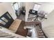 Grand foyer view from above showcases dark wood floors and a decorative glass front door at 5381 Waving Sage Dr, Las Vegas, NV 89149