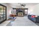 Cozy living room with fireplace, built-in shelving, and comfortable seating perfect for relaxation at 5381 Waving Sage Dr, Las Vegas, NV 89149