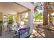 Covered patio includes comfortable seating and outdoor grill for entertaining at 5381 Waving Sage Dr, Las Vegas, NV 89149