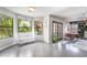 Bright sunroom with large windows offers views to the outdoors and access to living areas at 5381 Waving Sage Dr, Las Vegas, NV 89149
