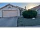 Charming single story home with a two car garage, desert landscaping, and stucco exterior at 5429 Chela Dr, Las Vegas, NV 89120