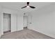 Bright bedroom featuring plush carpet, ample closet space, and neutral walls at 5617 Reiter Ave, Las Vegas, NV 89108