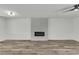 Cozy living room features an electric fireplace and modern fixtures at 5617 Reiter Ave, Las Vegas, NV 89108