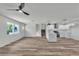 Inviting living space with a ceiling fan, modern finishes, and a seamless transition into the adjacent kitchen at 5617 Reiter Ave, Las Vegas, NV 89108