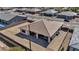 Backyard aerial view showcasing the roof, with a covered patio and surrounding neighborhood at 5851 Slate Rock Ct, Las Vegas, NV 89149