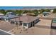 Beautiful exterior featuring a two-car garage and professionally landscaped front yard at 5851 Slate Rock Ct, Las Vegas, NV 89149