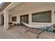 Covered patio features a hammock and views of backyard at 5851 Slate Rock Ct, Las Vegas, NV 89149