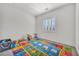 Playroom featuring a large educational rug with neutral carpet and natural light at 5851 Slate Rock Ct, Las Vegas, NV 89149