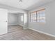 Bedroom featuring neutral carpet, mirrored closet, and natural light from window at 5861 Medallion Dr # 202, Las Vegas, NV 89122