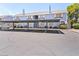 Two-story condo building with assigned covered parking and well-maintained landscaping at 5861 Medallion Dr # 202, Las Vegas, NV 89122