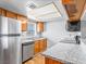 Modern kitchen featuring stainless steel refrigerator and appliances, and granite counters at 5861 Medallion Dr # 202, Las Vegas, NV 89122