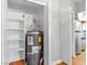 Enclosed water heater with adjacent shelving for household goods at 5861 Medallion Dr # 202, Las Vegas, NV 89122