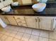 Bathroom vanity with double vessel sinks and granite countertop at 6704 Lost River Ct, Las Vegas, NV 89108