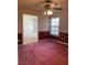 Bedroom featuring carpeted flooring, window with blinds, and ceiling fan at 6704 Lost River Ct, Las Vegas, NV 89108
