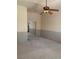 Spacious bedroom with carpet, ceiling fan, and mirrored closet doors at 6704 Lost River Ct, Las Vegas, NV 89108