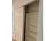Hallway closet with shelving behind sliding doors for ample storage space at 6704 Lost River Ct, Las Vegas, NV 89108