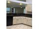 Spacious kitchen with granite countertops, stainless appliances, and open concept at 6704 Lost River Ct, Las Vegas, NV 89108
