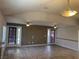 Living room featuring wood flooring, neutral paint, ceiling fan, and natural lighting at 6704 Lost River Ct, Las Vegas, NV 89108