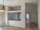 Inviting living area with stylish lighting and a seamless flow into other rooms at 6704 Lost River Ct, Las Vegas, NV 89108