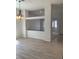Inviting living area with stylish lighting and a seamless flow into other rooms at 6704 Lost River Ct, Las Vegas, NV 89108
