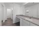 Modern bathroom with vanity, large mirror, and walk-in shower visible at 6713 Violet Cascade Ave, Las Vegas, NV 89156