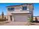 Beautiful two-story house featuring a two-car garage and charming curb appeal at 6713 Violet Cascade Ave, Las Vegas, NV 89156
