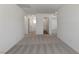 Hallway with carpet flooring leading to various rooms of the home at 6713 Violet Cascade Ave, Las Vegas, NV 89156