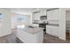 Stylish kitchen with quartz countertops, stainless steel appliances, and ample cabinet space at 6713 Violet Cascade Ave, Las Vegas, NV 89156