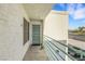 Balcony view of condo with gated doorway and neutral tones at 7100 Pirates Cove Rd # 2076, Las Vegas, NV 89145