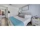 Bedroom with a bed, decor, and light-colored furniture, offering a cozy, modern design at 7100 Pirates Cove Rd # 2076, Las Vegas, NV 89145