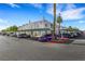 Condominium building with covered parking and well-maintained landscaping on a bright, sunny day at 7100 Pirates Cove Rd # 2076, Las Vegas, NV 89145