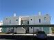 Well-maintained condominium building featuring private covered parking and bright, neutral-toned exterior at 7100 Pirates Cove Rd # 2076, Las Vegas, NV 89145