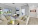 Comfortable living room featuring a fireplace, tv, couch, and natural lighting at 7100 Pirates Cove Rd # 2076, Las Vegas, NV 89145