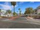 Street view showcasing manicured landscaping and neighborhood architecture at 7100 Pirates Cove Rd # 2076, Las Vegas, NV 89145