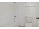 A well-lit bathroom features a shower-tub combination and toilet at 7263 Pepperbox Ave, Las Vegas, NV 89179