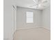 Bedroom with neutral carpet, ceiling fan, window, and closet at 7263 Pepperbox Ave, Las Vegas, NV 89179