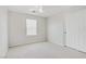 This bedroom offers a ceiling fan, large window, and a closet for storage at 7263 Pepperbox Ave, Las Vegas, NV 89179