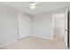 Bedroom with a neutral aesthetic featuring a closet and doorway to hallway at 7263 Pepperbox Ave, Las Vegas, NV 89179