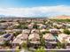 Gorgeous aerial view showcasing the homes within this community, with mountain views at 7854 Brianna Cheerful Ave, Las Vegas, NV 89178