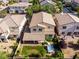 Aerial view of home showcasing backyard, hot tub, patio, and mature landscaping at 7854 Brianna Cheerful Ave, Las Vegas, NV 89178