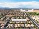 Stunning aerial view showcasing the neighborhood and nearby Exploration Peak Park, with mountain views at 7854 Brianna Cheerful Ave, Las Vegas, NV 89178