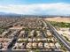 Panoramic aerial of a Primary-planned community with easy highway access under a bright blue sky at 7854 Brianna Cheerful Ave, Las Vegas, NV 89178