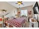 Bedroom with ceiling fan and comfortable bed and lots of natural light at 7854 Brianna Cheerful Ave, Las Vegas, NV 89178